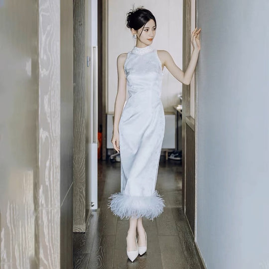 Modern White Qipao with Chic Feather Finishings